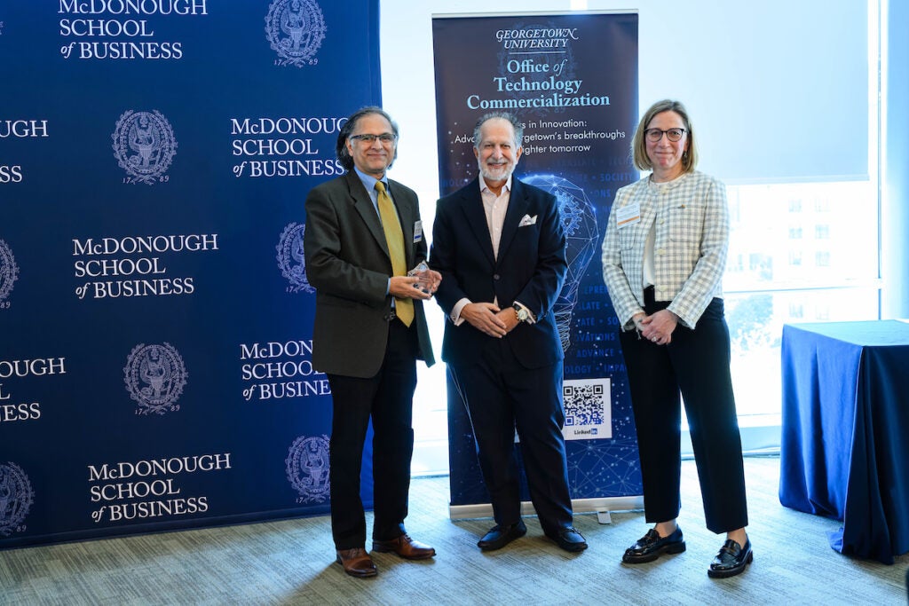 OTC Recognition Award recpient Makarand Paranjape with Dimolitsas and Litvin-Vechnyak