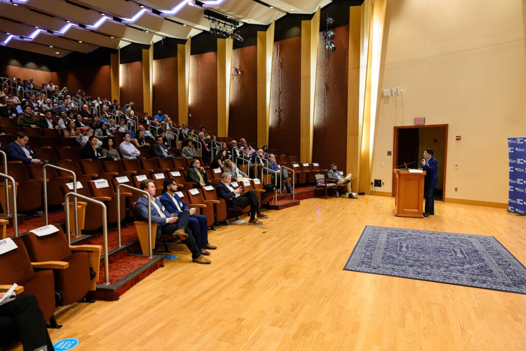 Researchers and leaders from the university and the medical center spoke to a packed house at the event.