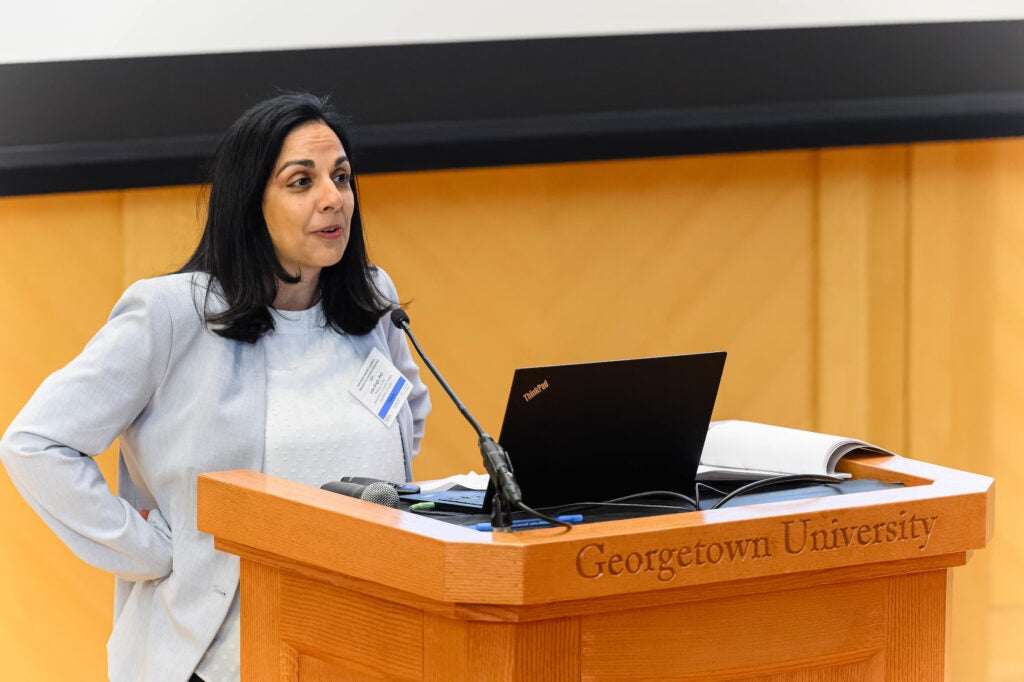 Researchers and leaders from the university and the medical center spoke to a packed house at the event.