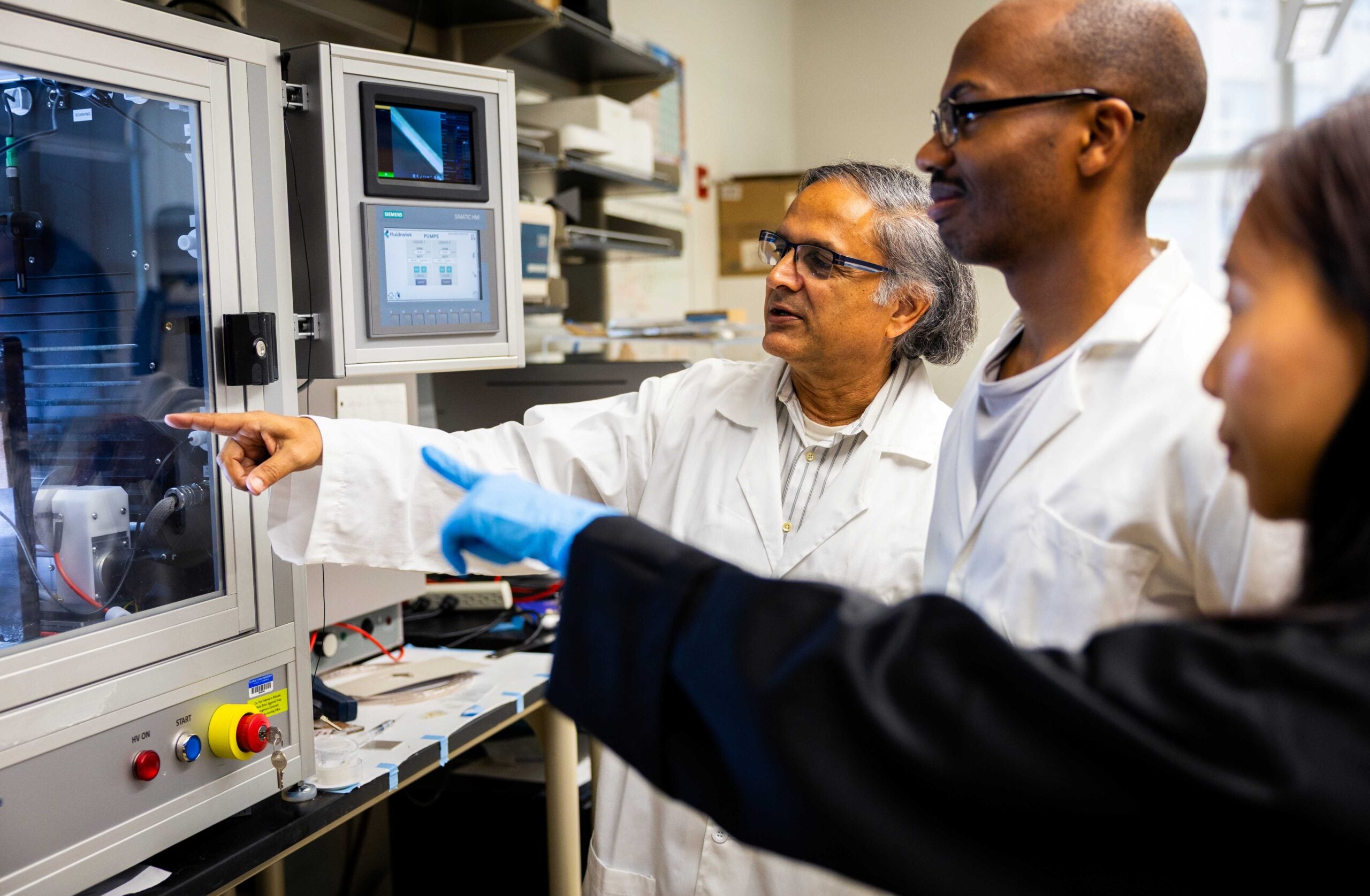 Makarand Paranjape and team in lab